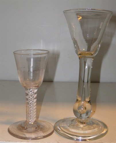 Lot 89 - An 18th century opaque twist wine glass and a soda glass wine