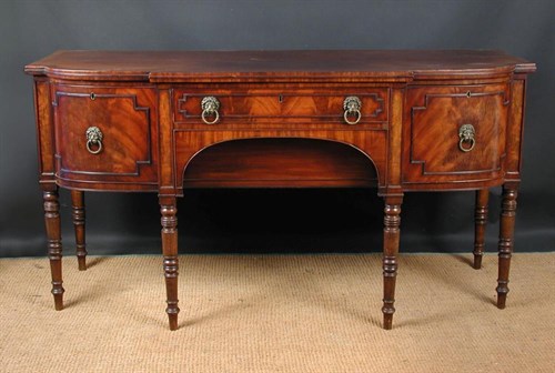 Lot 699 - A Regency mahogany breakfront sideboard, circa 1820