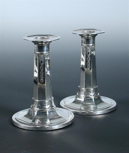 Lot 307 - A small pair of silver dwarf candlesticks