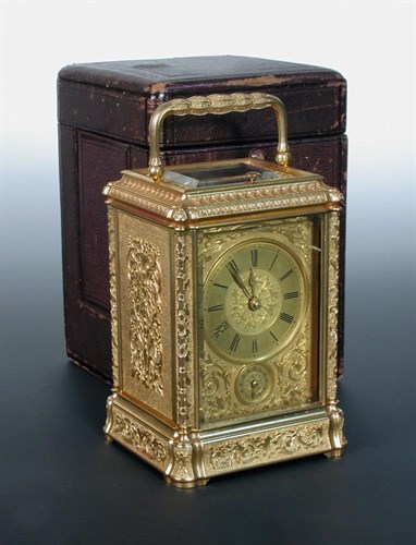 Lot 634 - A decorated gilt brass repeating carriage clock with alarm, late 19th century