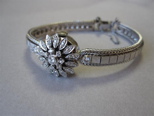 Lot 161 - An American diamond set lady's cocktail watch by Wittnauer