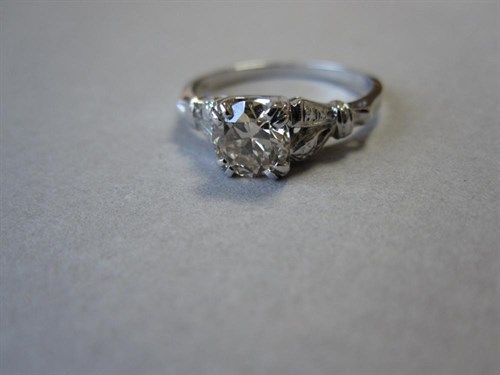Lot 144 - A 'champagne' diamond single stone ring