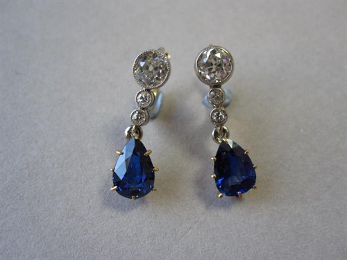 Lot 179 - A pair of diamond and sapphire eardrops