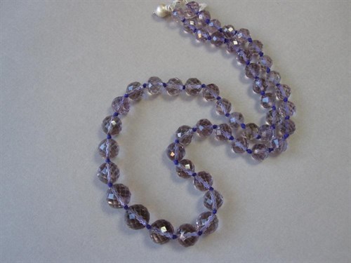 Lot 152 - A faceted amethyst bead necklace