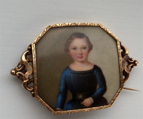 Lot 564 - 'S Birckman', a portrait miniature on porcelain mounted as a brooch