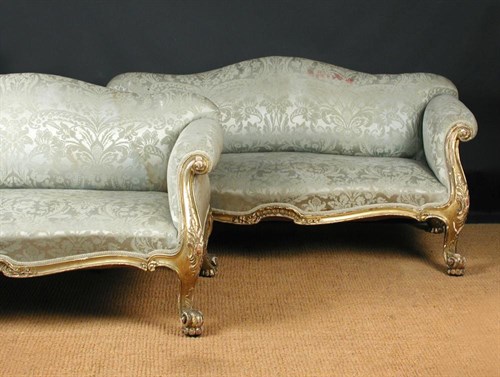 Lot 869 - A pair of late Regency gilt wood framed sofa's, circa 1830