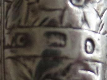 Lot 399 - A group of twelve miniature silver whistles