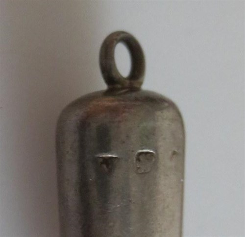 Lot 399 - A group of twelve miniature silver whistles