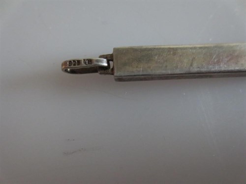 Lot 399 - A group of twelve miniature silver whistles