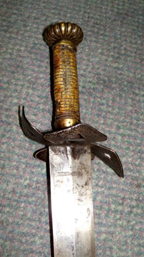 Lot 667 - A 19th/20th century Sudanese sword in leather scabbard