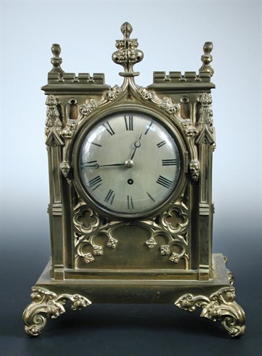 Lot 781 - A mid-19th century brass bracket timepiece in the Gothic taste