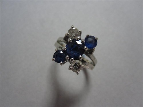 Lot 179 - A sapphire, diamond and 18ct white gold dress ring