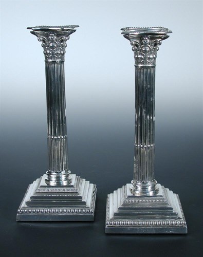 Lot 420 - A pair of silver table candlesticks