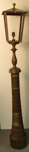 Lot 702 - An early 20th century serpentine lighthouse lamp