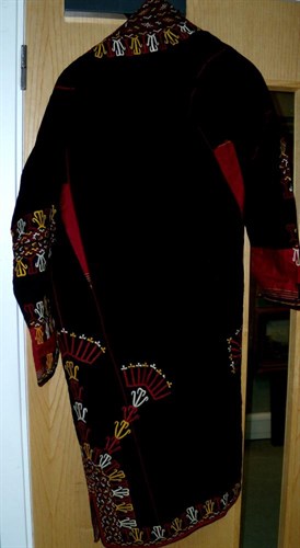 Lot 672 - A Persian black robe (shapan)