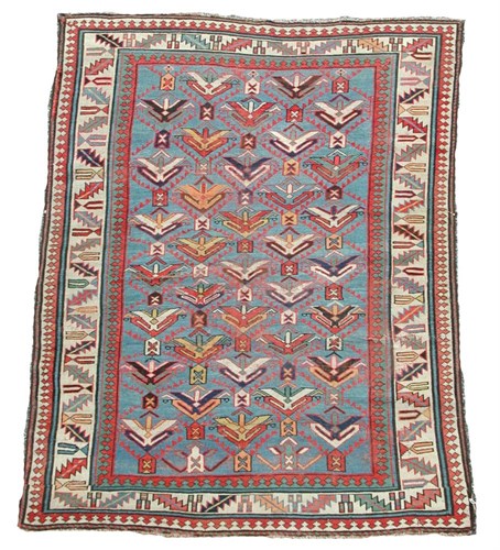 Lot 929 - A Genjie Caucasian blue ground wool rug