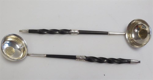 Lot 417 - Two small George III silver toddy ladles