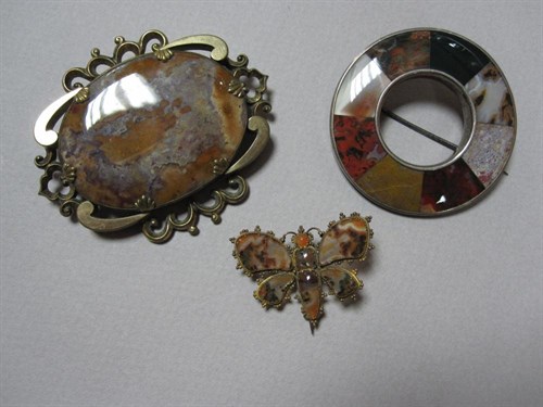 Lot 127 - A Victorian moss agate butterfly brooch and two other Scottish 'pebble' brooches