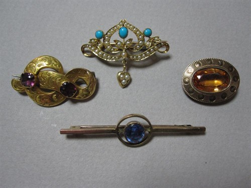 Lot 168 - An Edwardian turquoise and seed pearl brooch together with three other gemset brooches
