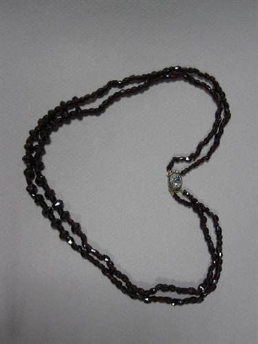 Lot 247 - A  Georgian garnet bead necklace with diamond clasp