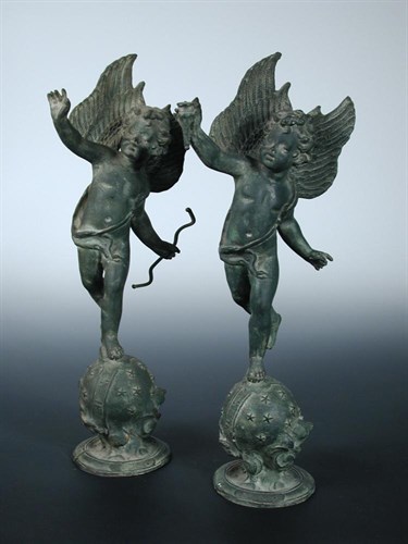 Lot 704 - A pair of early 20th century bronze cherubs