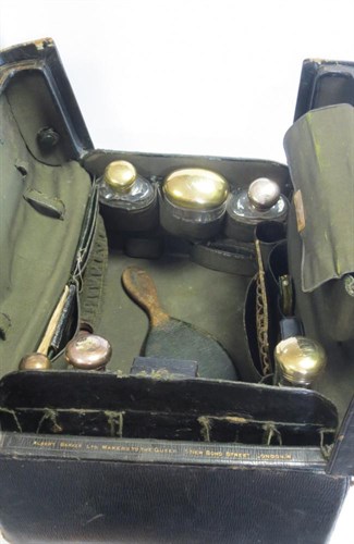 Lot 334 - A lady's green leather dressing case