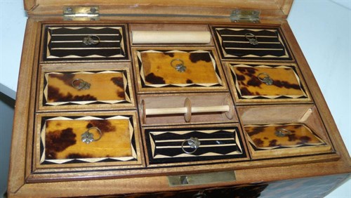 Lot 701 - A 19th century tortoiseshell-clad work box