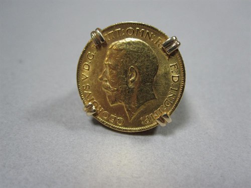 Lot 174 - A 1912 gold sovereign set in a 9ct gold ring