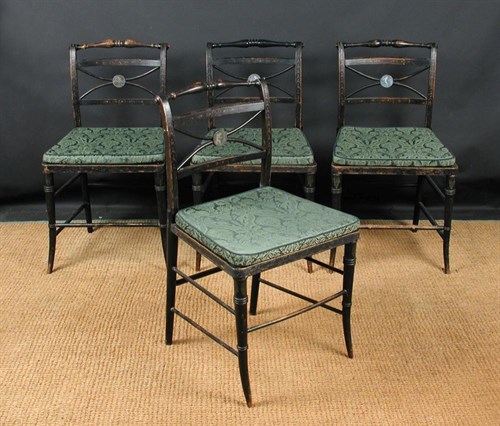 Lot 886 - A set of four painted Regency dining chairs, circa 1810