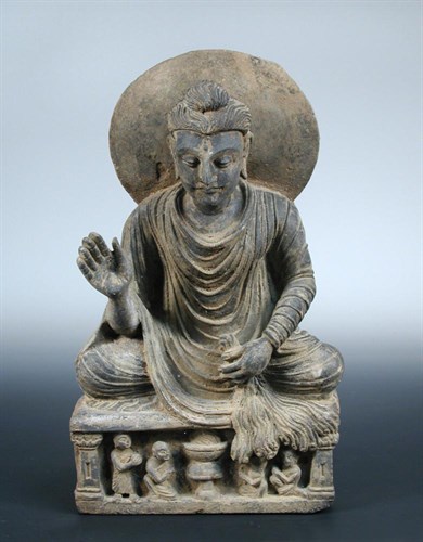 Lot 708 - A Ghandaran grey schist Buddha