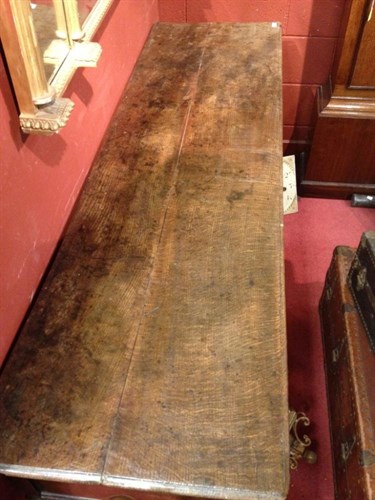 Lot 827 - A George III oak dresser base, circa 1770