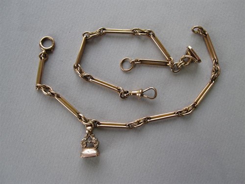 Lot 134 - Two parts of a 19th century 9ct rose gold watch chain
