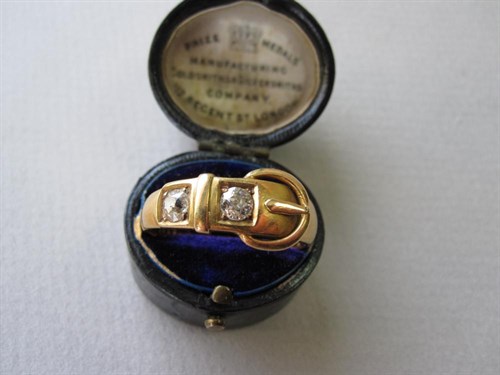 Lot 120 - A Victorian 18ct gold diamond set buckle ring