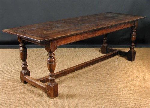 Lot 794 - An oak refectory table,  20th century