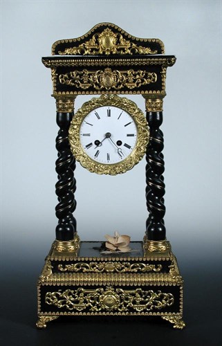 Lot 784 - A French 19th century gilt metal mounted portico clock