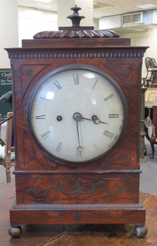 Lot 771 - A Regency rosewood and brass inlaid bracket clock