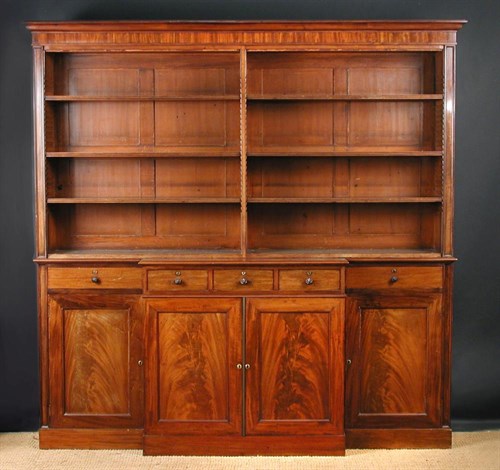 Lot 910 - An early Victorian mahogany breakfront bookcase,  circa 1830