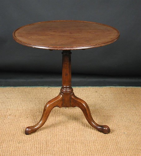 Lot 850 - A George III mahogany tripod table, circa 1760