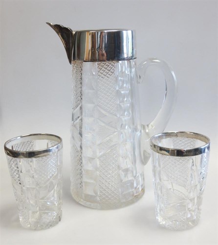 Lot 308 - A late Victorian silver mounted cut glass water jug with two matching tumblers
