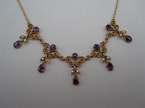Lot 137 - An Edwardian amethyst and seed pearl fringe necklace