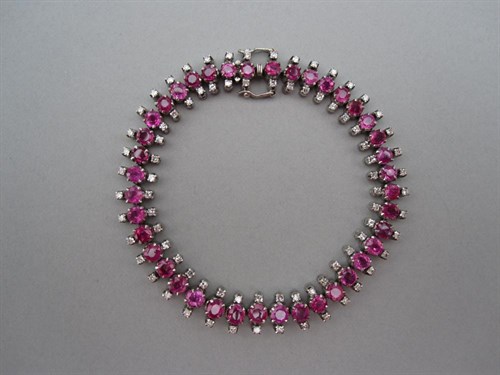 Lot 254 - A ruby and diamond triple line bracelet