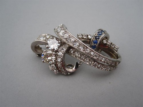 Lot 181 - A diamond and sapphire brooch