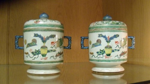 Lot 47 - A pair of 19th century Samson famille verte jars and covers