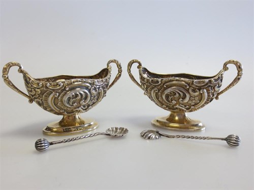 Lot 304 - A small pair of Victorian silver gilt salts