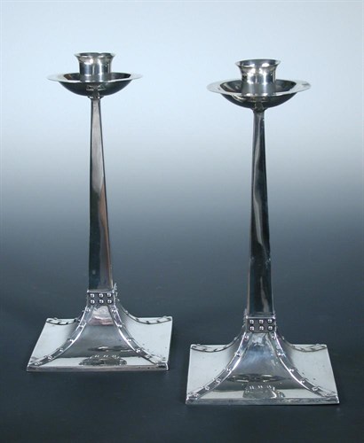 Lot 353 - A pair of silver candlesticks
