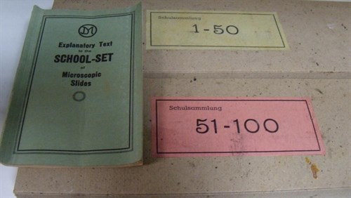Lot 695 - J D Moller, two 20th century sets of teaching microscope slides with 'Explanatory text'