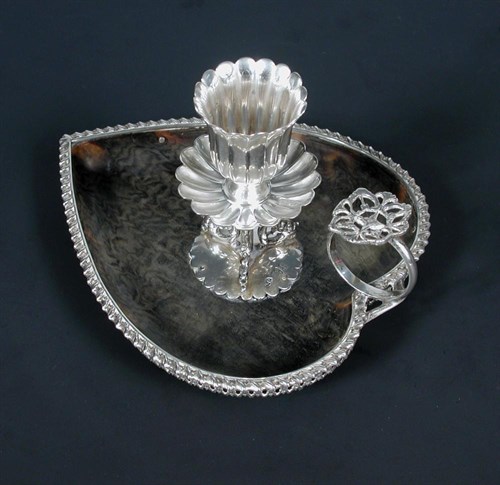 Lot 411 - A Victorian silver and tortoiseshell chamberstick
