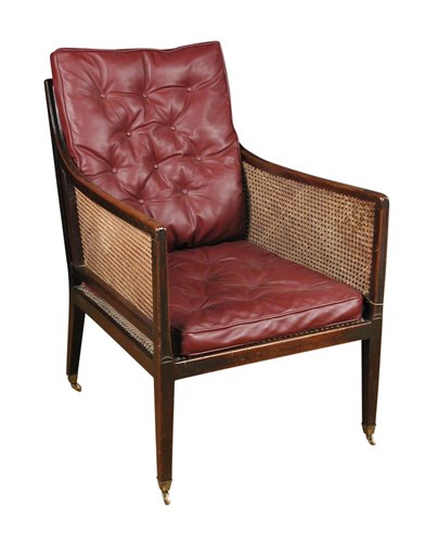 Lot 877 - A Regency mahogany library bergere