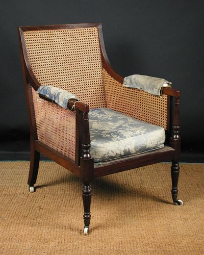 Lot 898 - A Regency mahogany framed library bergere