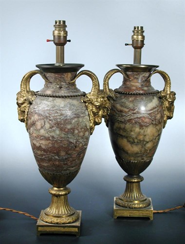 Lot 715 - A pair of 'Adam' marble urns later fitted as lamps, 19th century